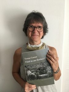 Teresa Carson with her book Visit to an Extinct City